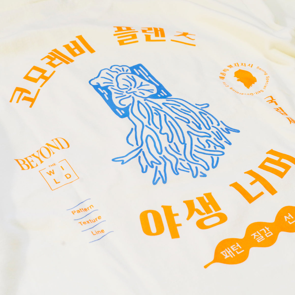comolebi plants LOGO TEE KOREA [FADE WASHED WHITE/orange・blue]